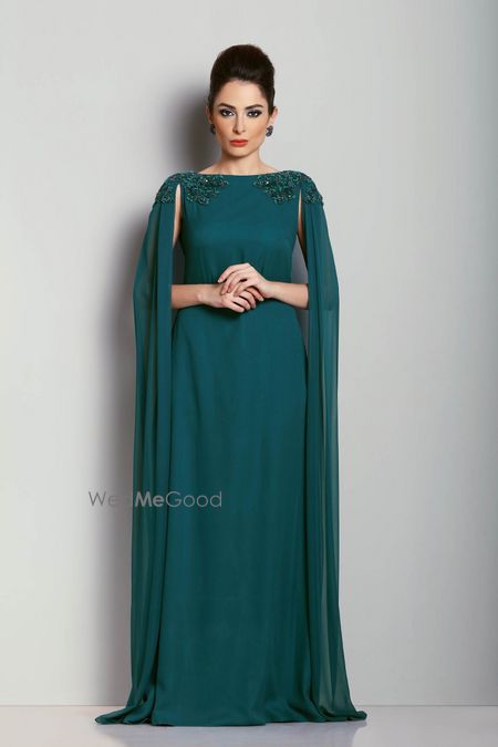 Photo of Teal evening gown with shoulder embroidered cape