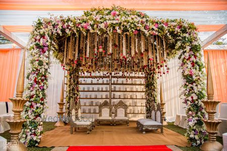 Photo of Fairytale floral mandap with hanging strings