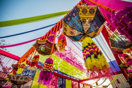 Photo of Colourful hanging umbrellas for mehendi decor