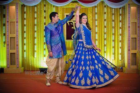 Photo of ink blue engagement lehenga