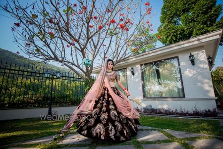 Photo of Offbeat bridal lehenga with deep maroon velvet skirt