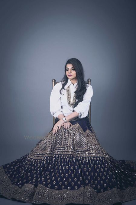 Photo of off beat ethnic fusion black and gold lehenga