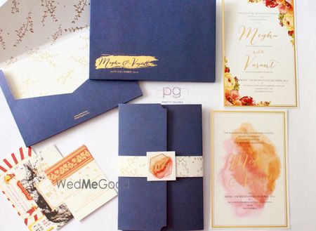 Photo of simple blue and white theme wedding invites