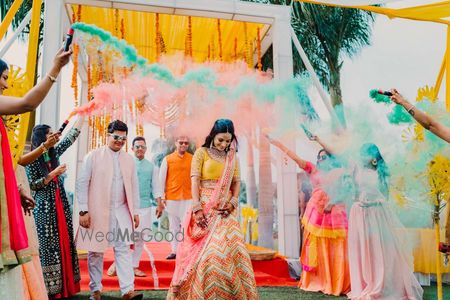 Photo of Couple entry with smoke sticks