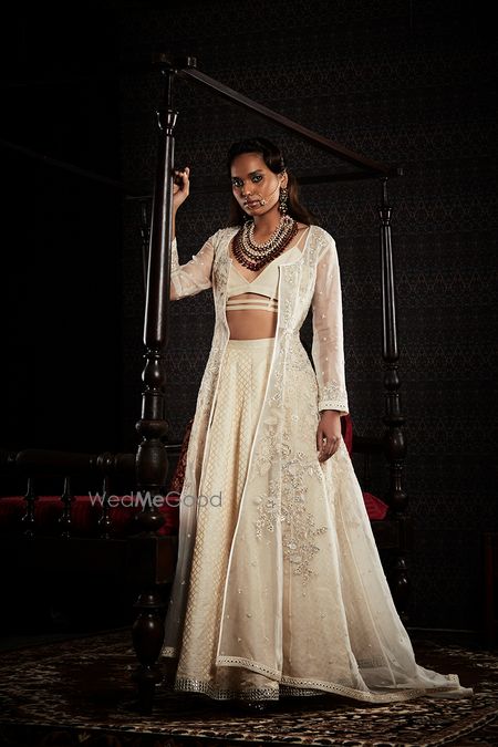 Photo of Offwhite lehenga with jacket