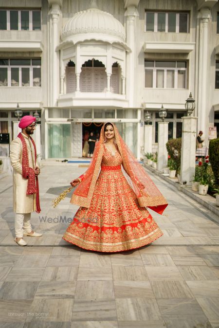 Photo of Twirling bride shot