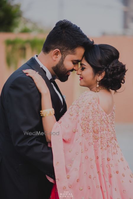 Photo of Light pink embellished cape for engagement