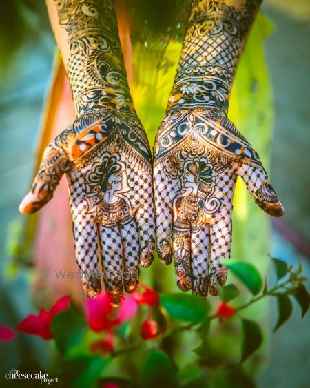 Photo of Modern mehendi design with jali and portraits