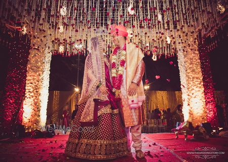 Photo of Romantic couple shot at mandap after pheras