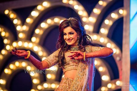 Photo of Dancing bride shot on her sangeet