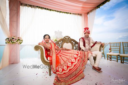 Photo of red and gold lehenga