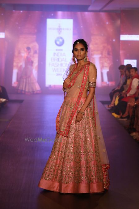 Photo of baby pink lehenga with all over gold work