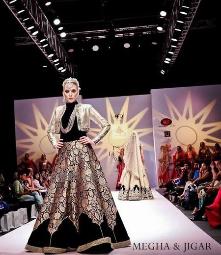 Photo of black and gold lehenga