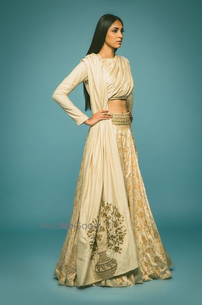 Photo of white and gold lehenga