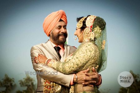 Photo of Happy bride and father shot on wedding day