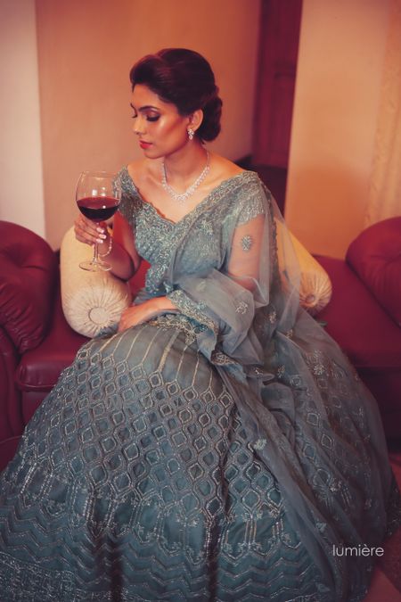 Photo of Off shoulder grey lehenga for engagement