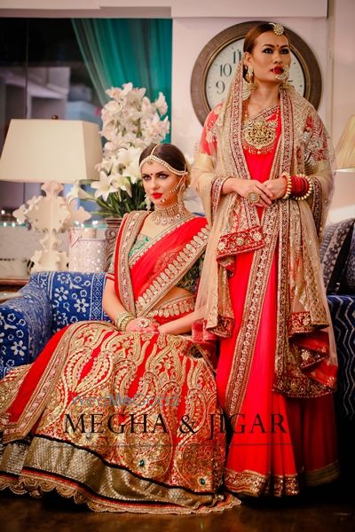 Photo of red bridal lrhrngs. red sraee