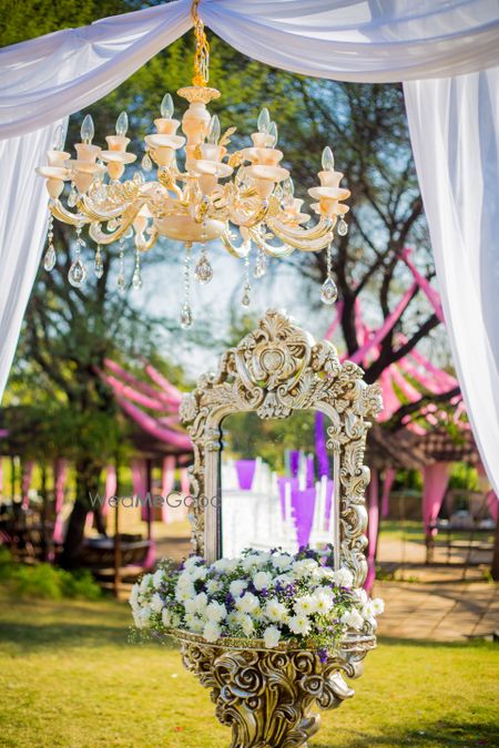 Photo of Entrance decor with dresser and chandelier