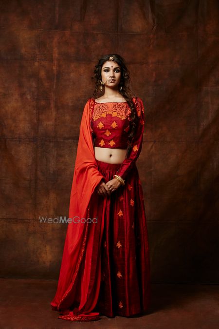 Photo of orange and red lehenga