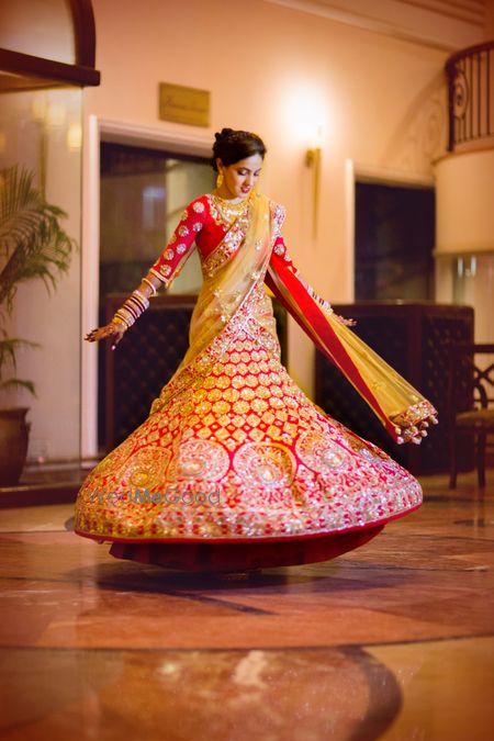 Photo of red and gold lehenga