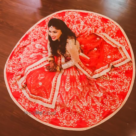 Photo of coral red lehenga