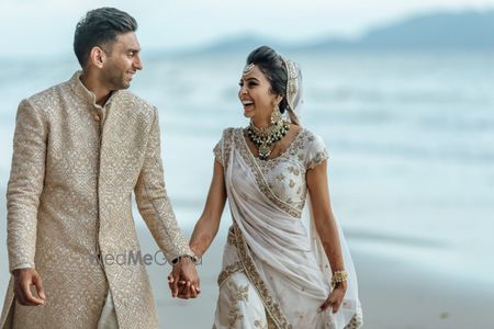 Photo of Beach wedding with happy couple shot