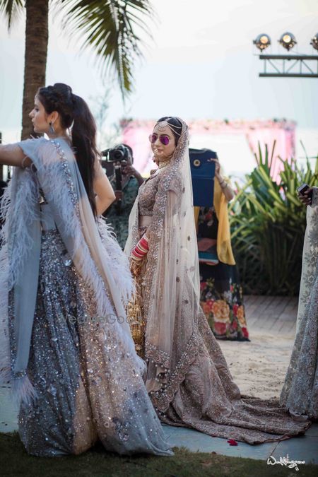 Photo of Bride and sisters outfit with train