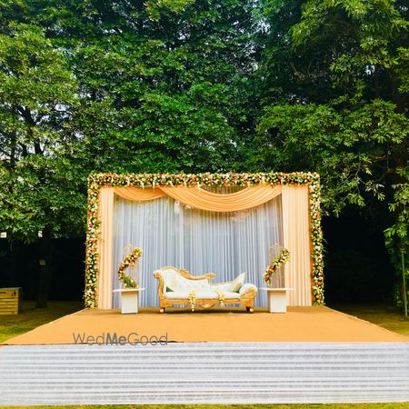 Photo of Lovely peach stage decor with florals