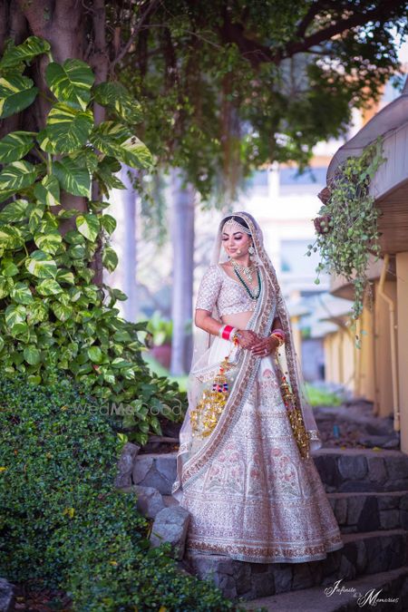 Photo of White embroidered bridal lehenga for offbeat bride