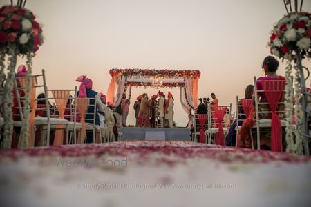 Photo of Beach Wedding Floral Entrance Decor