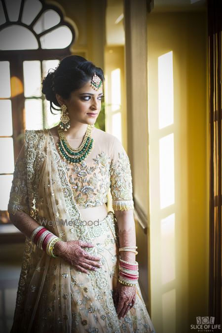 Photo of Cream embellished lehenga for engagement