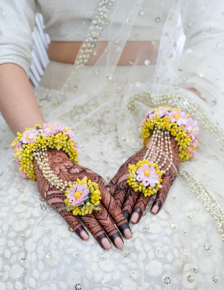 Photo of Dry floral yellow mehendi haathphool