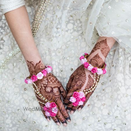 Photo of Dry floral pink mehendi haathphool