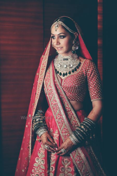 Photo of Statement bridal jewellery with green Chura