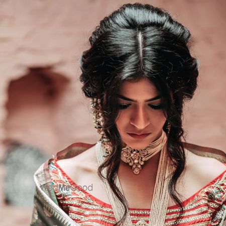 Photo of Pearl necklace and choker with unique hairstyle