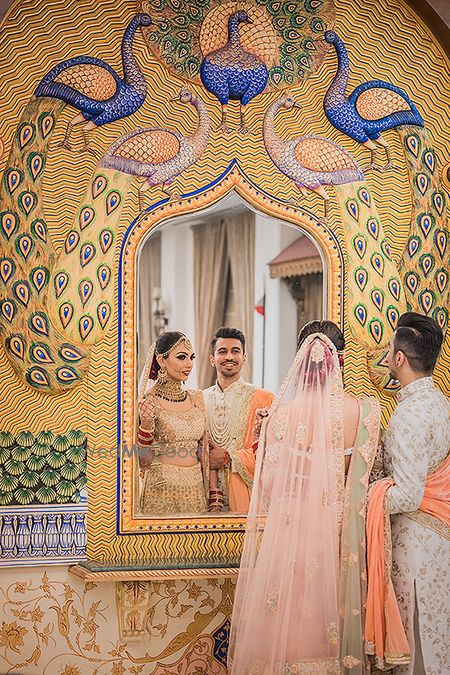 Photo of Unique cute couple portrait mirror