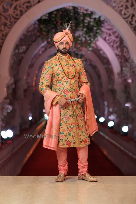 Photo of Pretty peach and cream sherwani for wedding