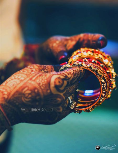 Photo of red and gold bangles