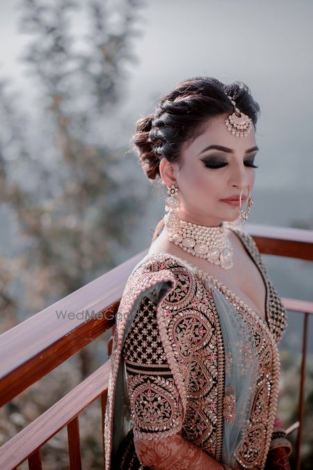 Photo of Bride with smokey eyes and offbeat lehenga