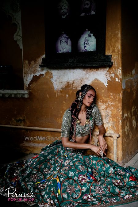 Photo of Dark green embroidered mehendi lehenga