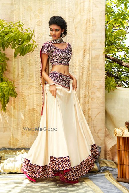 Photo of cream and deep purple lehenga