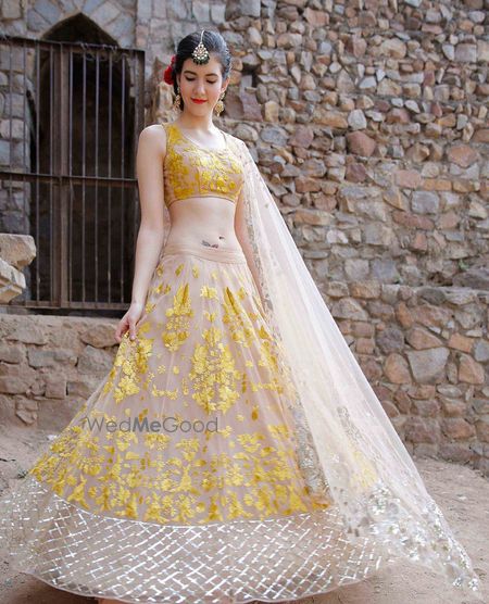 Photo of sh and Yellow Lehenga by Astha Narang