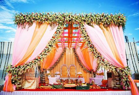 Photo of Breathtaking mandap decor for a day wedding.