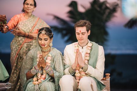 Photo of A stunning couple shot at their mandap.