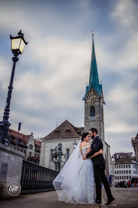 Photo of Romantic couple on their wedding day at a picturesque location.