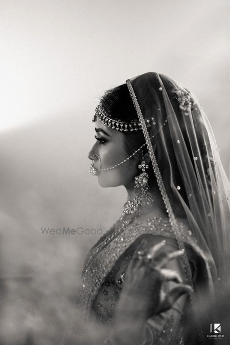 Photo of Black and white side bridal shot