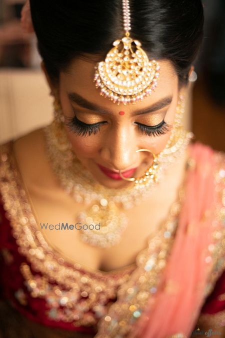 Photo of Bridal close up shot showing maangtikka