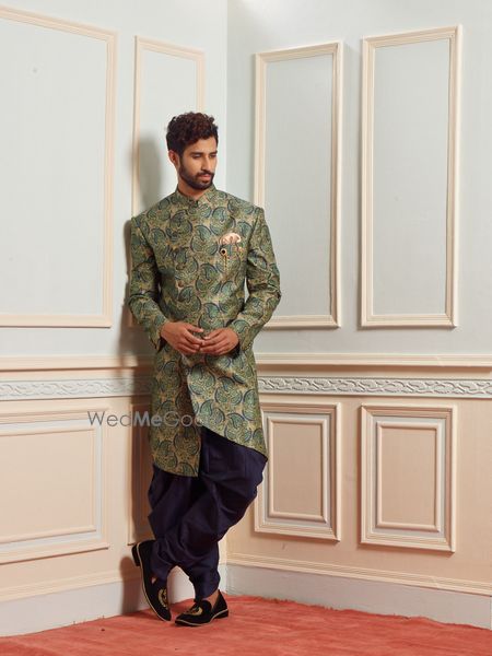 Photo of A complete engagement look in a stunning sherwani.