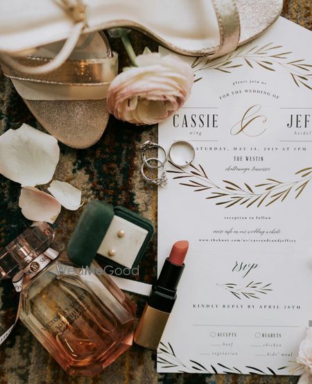 Photo of Getting ready shot with card perfume and bridal jewellery