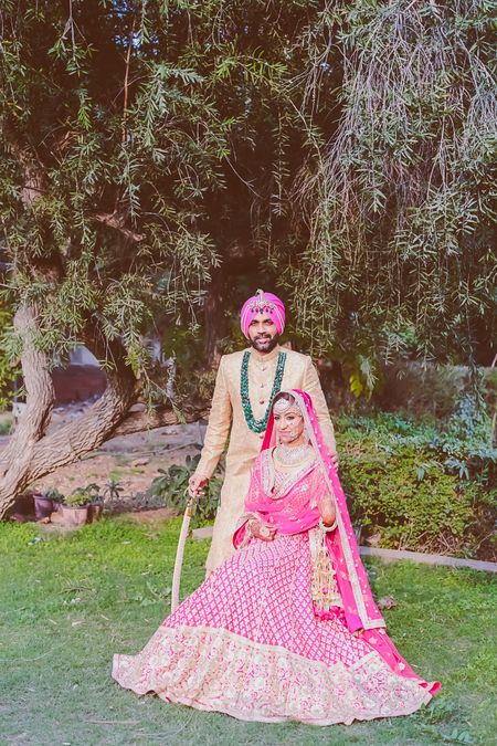 Photo of pink and gold lehenga